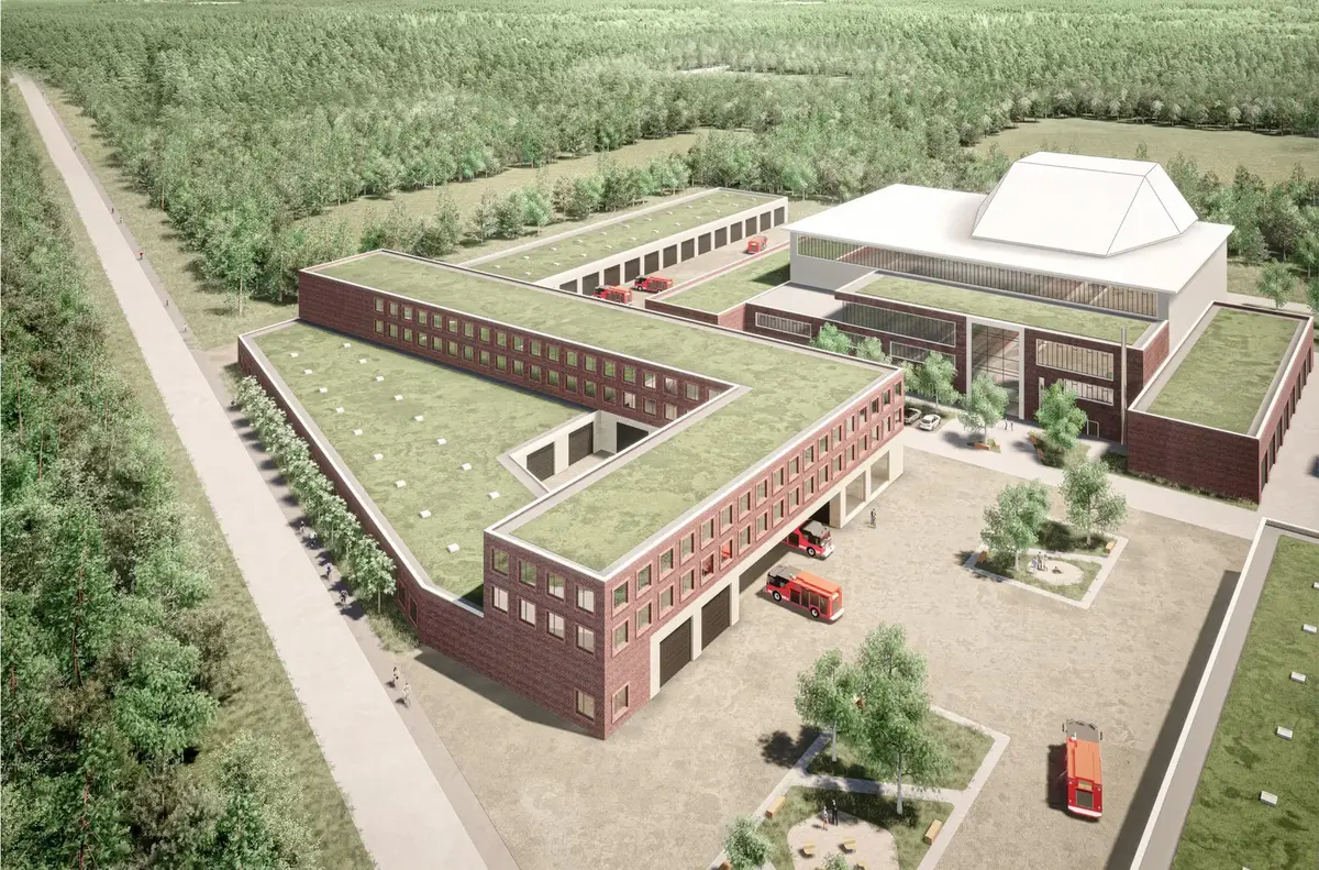 Aerial rendering of the Telgte training campus with green-roofed brick buildings, fire engines in the courts and forest all around.